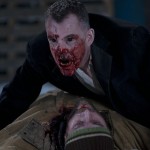 The head vampire from 30 Days of Night feeding.